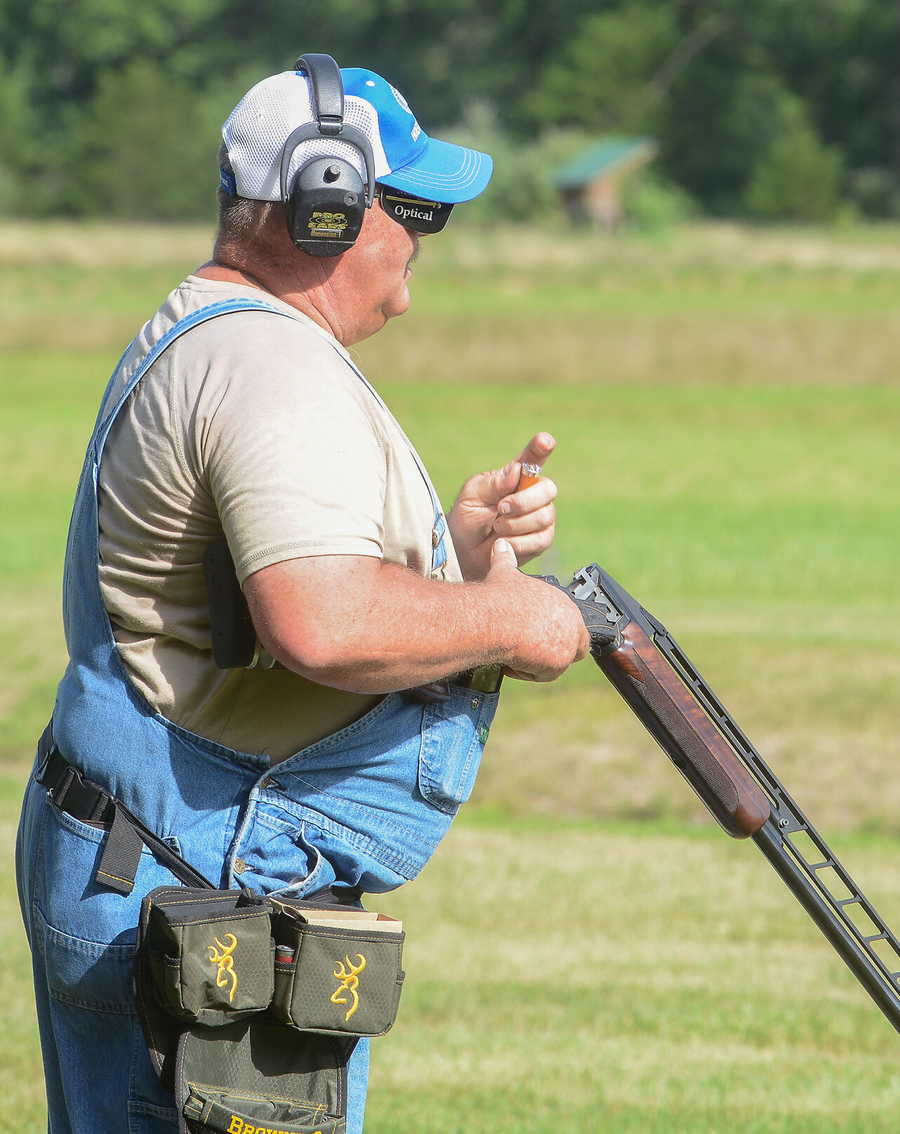Bobby Rounkles reloads his gun